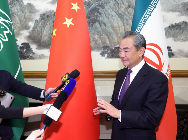 Chinese Foreign Minister Wang Yi addresses the press after the trilateral Saudi-Iran talks in Beijing, 10 March 2023.