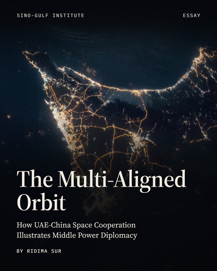 The United Arab Emirates at night photographed from the International Space Station, with the title The Multi-Aligned Orbit