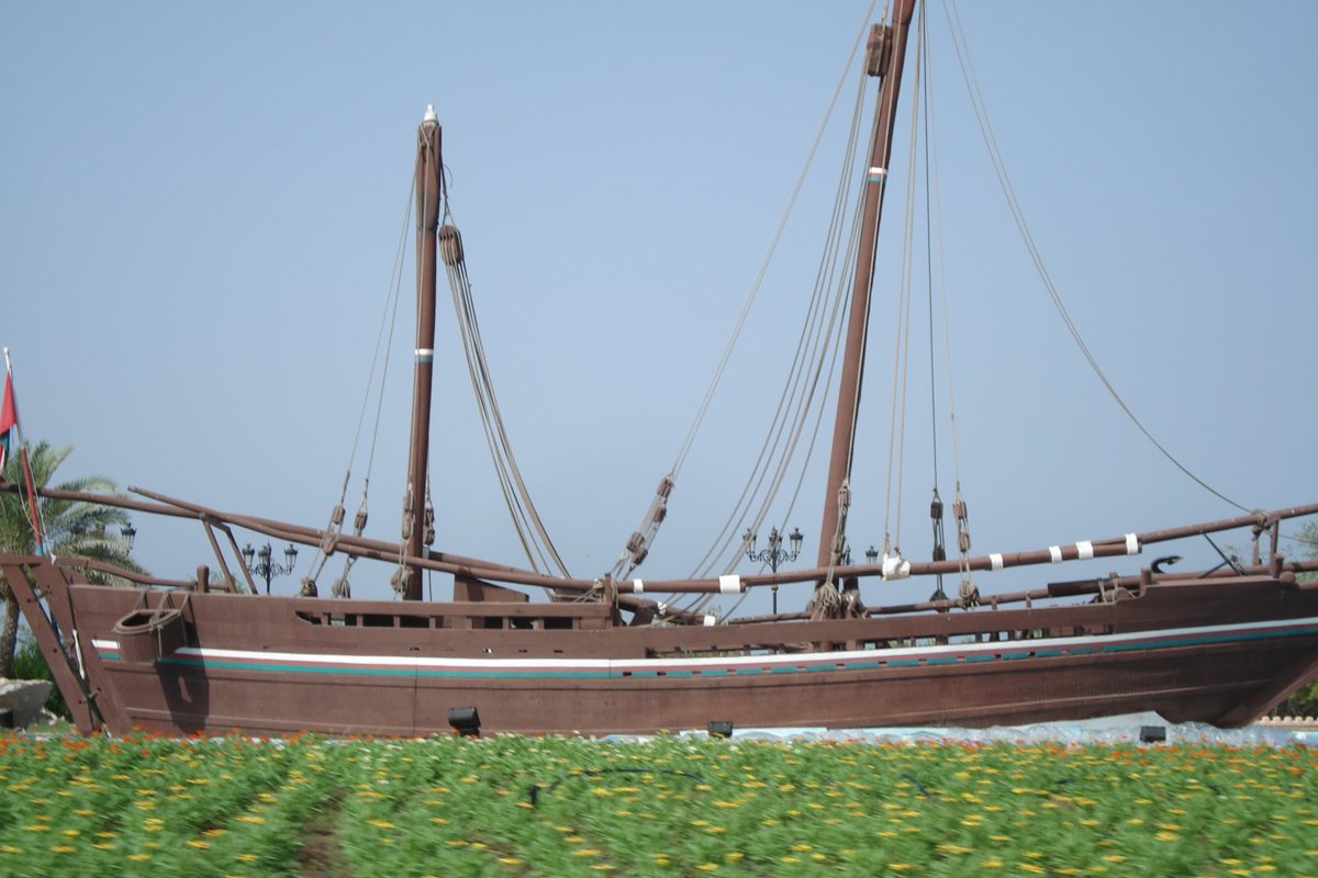 The Sohar, Tim Severin's hand-sewn replica dhow, preserved as a monument on a roundabout near Muscat, Oman.